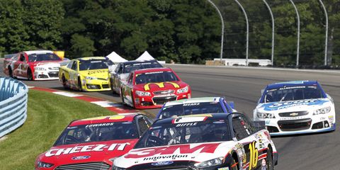 NASCAR drivers jockey for the lead during a race at Watkins Glen last year. Recently, in a poll overseen by USA Today, Watkins Glen was named "Favorite NASCAR Track."