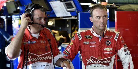 Rodney Childers, left, signed a multiyear deal with Stewart-Haas Racing to continue in his role as crew chief for Kevin Harvick, right.
