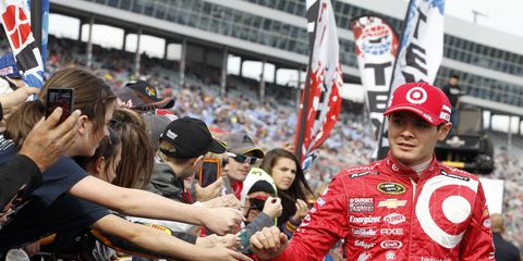 NASCAR's Kyle Larson, shown, and IndyCar's Scott Dixon will receive more promotional funds from Target in 2015. The retailer is cutting out its sponsorship of one IndyCar in order to promote the other two drivers.