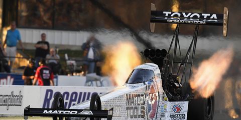 Antron Brown made a track record pass of 3.713 seconds, 329.42 mph, in Englishtown Friday.
