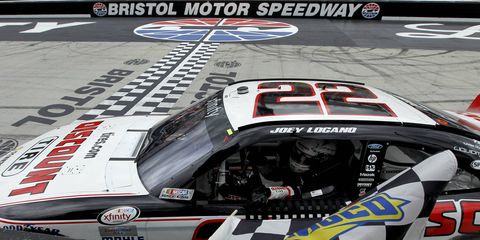 Joey Logano took the checkered flag on Saturday after he won the NASCAR Xfinity race at Bristol Motor Speedway.