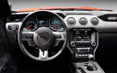 The interior of the 2015 Mustang features all of the creature comforts of the outgoing model plus better ergonomics.