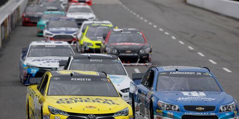 Matt Kenseth, front left, did what he set out to do on Sunday at Martinsville -- take out rival Joey Logano.