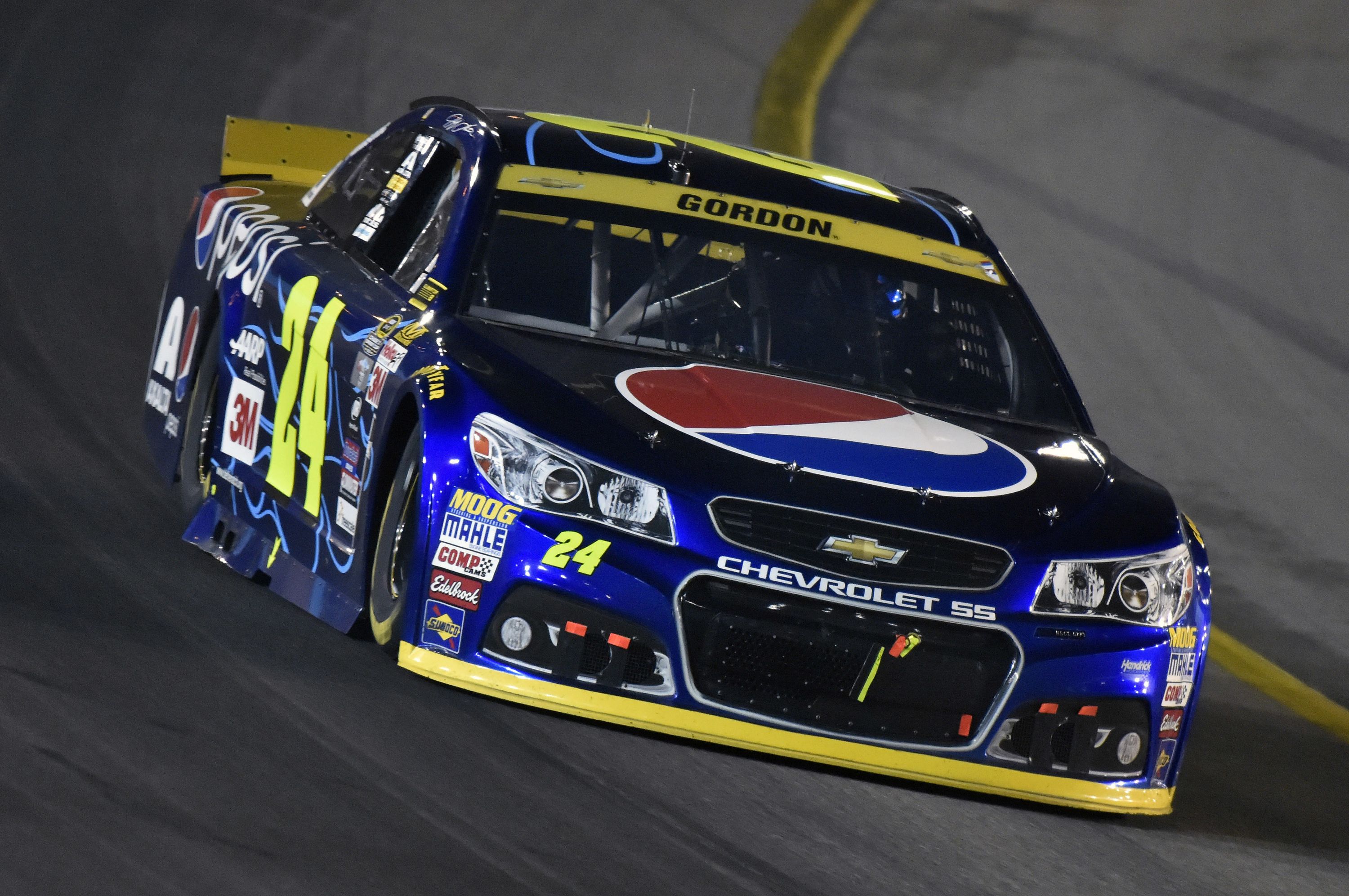 Got 'em! Jeff Gordon celebrates in Victory Lane for first