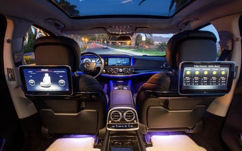 In the interior of the Mercedes-Maybach S-Class, passengers are enveloped in lounge-style, modern luxury.