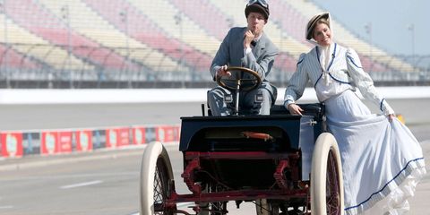 Brad Keselowski and NBC's Kelli Stavast enjoy a vintage 1901 ride at Michigan International Speedway on Friday.