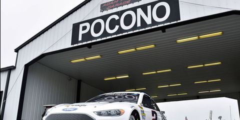 Brad Keselowski rolls out of the garage area at Pocono Raceway on his way to his first pole of the NASCAR Sprint Cup Series season.