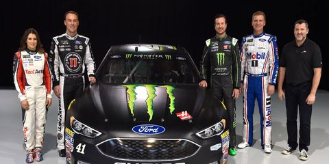 Stewart-Haas Racing drivers Danica Patrick, Kevin Harvick, Kurt Busch and Clint Bowyer join team co-owner Tony Stewart in welcoming the team's new Ford Fusion to the fold. The team is making the switch from Chevrolet power.