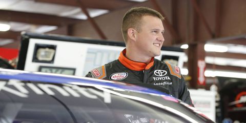 Ryan Preece climbs out of his MoHawk Northeast Inc. Toyota Camry on Friday at the New Hampshire Motor Speedway.