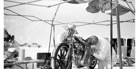 The Mangold Motorworks 1947 Triumph gets some work in the pits on Sunday morning. Photographed with 1900 No. 3 Pocket Folding Kodak camera, Rollei RPX 25 film.