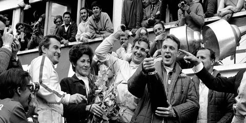 Dan Gurney kicks off a tradition with the spraying of champagne following his win at Le Mans in 1967.