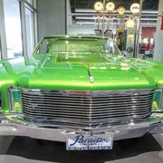 The lowrider exhibit at the Petersen Automotive Museum in Los Angeles was so door-bustin' popular that they added four more cars in the lobby. Here are three of them. This is Jose Alvarez' 1972 Monte Carlo "Fatal Attraction"