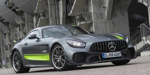 The 2020 Mercedes AMG GT R Pro in grey with a green racing stripe, subtle and loud all at once