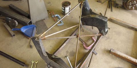 Enough of the Lexus SC400 suspension-donor frame was preserved, with stiffeners welded in place, to make a front suspension jig for the 1941 Plymouth project.