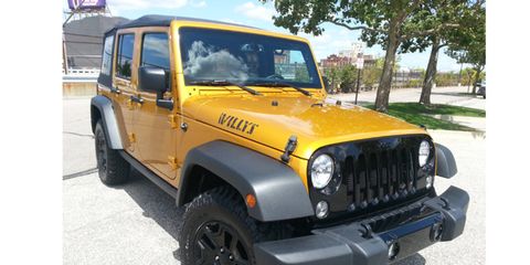 The 2014 Jeep Wrangler Unlimited Willys Wheeler comes in at a base price of $27,190 with our tester topping off at $34,880.