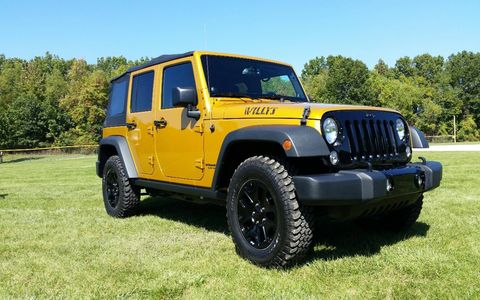 Having the ability to pull the doors off of the 2014 Jeep Wrangler Unlimited Willys Wheeler makes it an excellent summer cruiser.