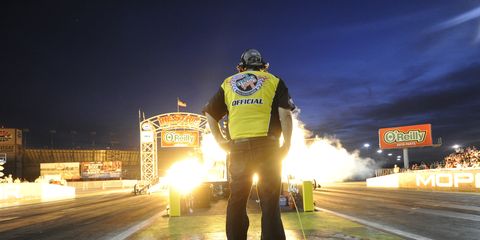 Standing at the starting line for an NHRA drag race is a lot like getting ready for a "firecracker enema."