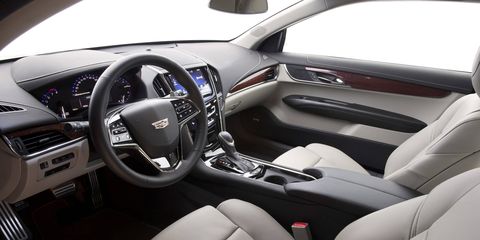 The ATS Coupe 3.6L V6 is rated at 333 horsepower and 285 lb-ft of torque. Shown here is the 2015 model, which is visually identical to the 2016 model.