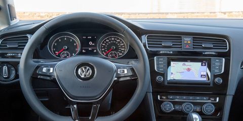The interior of the 2015 Volkswagen Golf 1.8T S 4-Door is a class-act. Automatic transmission shown.