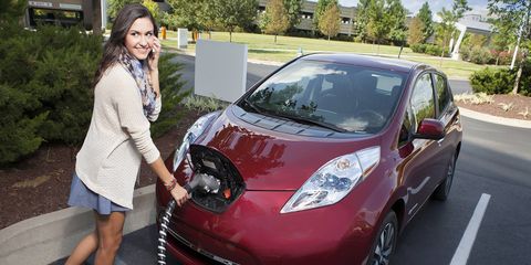 This woman can't even believe she bought the 100,000th electric car. Maybe.
