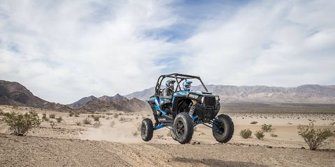 The two passenger XP Turbo EPS feels equal parts dirt bike, rally car and Baja buggy.