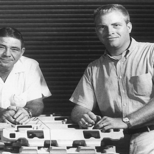 Vic Edelbrock Jr., right, poses with his father. Edelbrock Sr. began the automotive parts business that bears the family name in 1933.