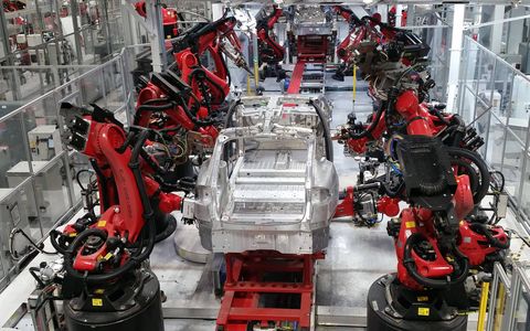 As befits a car assembly plant located in Silicon Valley's sphere of influence, robots are everywhere in the Tesla Plant.
