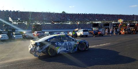 Jimmie Johnson was sent to the garage once his team touched the car under red-flag conditions at Talladega.