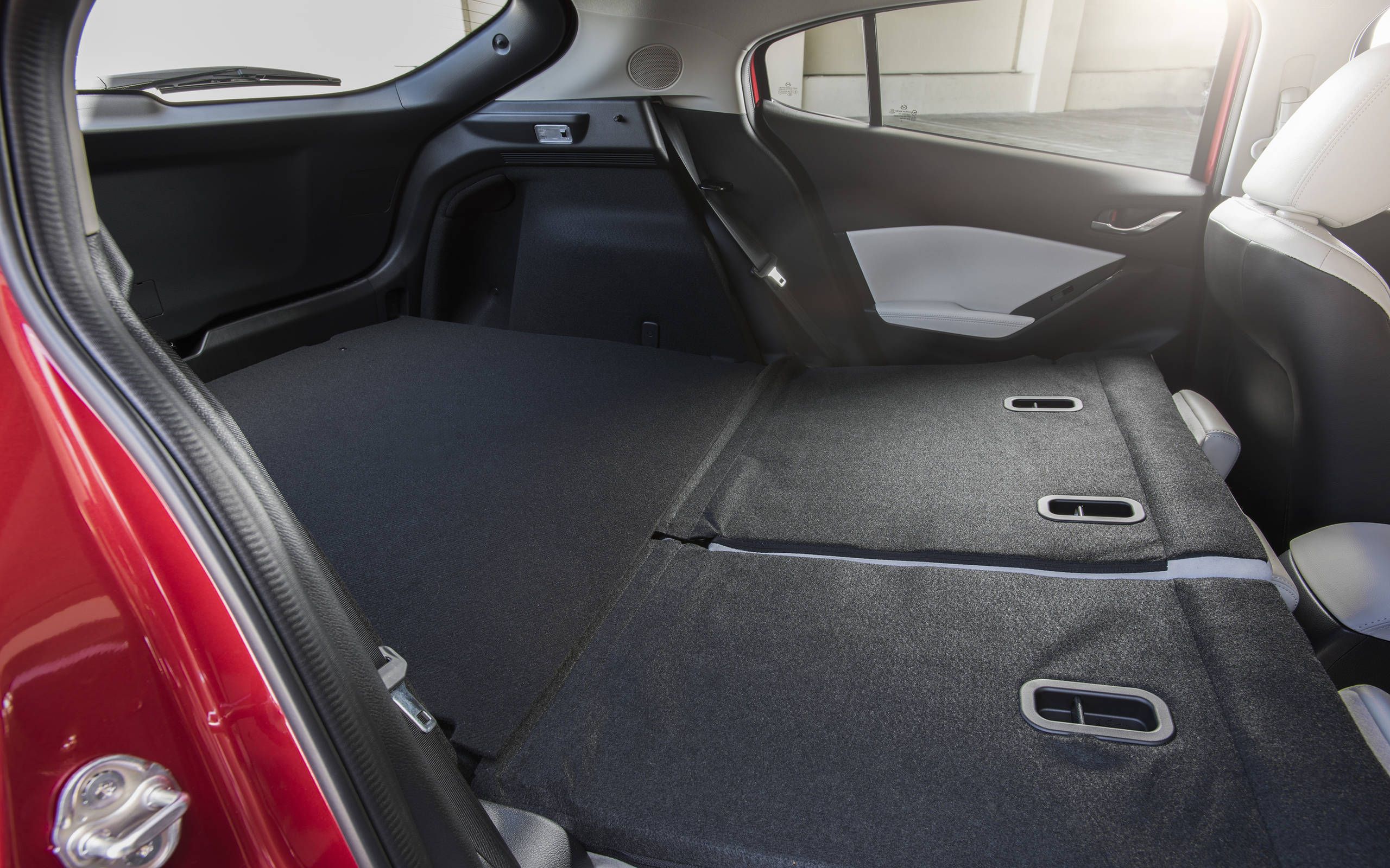 Mazda 3 outlet rear seat release