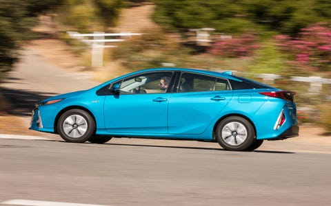 The Prius Prime is a plug-in hybrid version of the Toyota Prius that can go 25 miles on a charge thanks to a bigger, much bigger, 8.8-kWh battery. It achieves 55 mpg city, 53 highway and 54 combined, for a total range of 640 miles. Still looks like and drives like a Prius, though. You can't have everything.