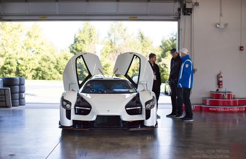 The 2018 SCG 003s getting ready to head out on to the Monticello track with the crew in the garage.