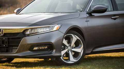 The redesigned Accord serves up 252 hp courtesy of a turbocharged 2.0-liter inline-four.