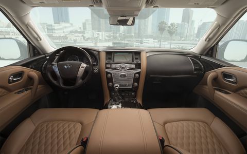 The 2018 Infiniti QX80's interior is full of soft leather and luxe-looking wood accents.