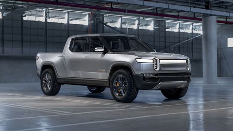 The Rivian R1T electric pickup gets 400-plus miles of range and a motor at each wheel.