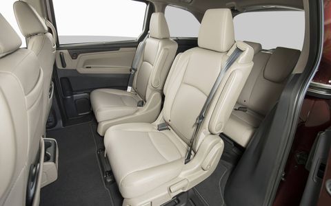 With the center seat removed, the remaining second-row seats can glide fore and aft and side to side.