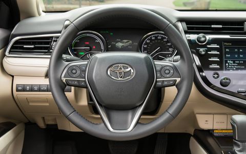 The 2018 Toyota Camry XLE Hybrid has 15.1 cubic feet of cargo space.