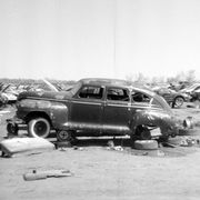 Postwar Detroit sedans aren't worth much as restoration projects, so a surprising number still show up in America's big self-service wrecking yards. This one ends its days next to a 21st-century Dodge Stratus in Denver.

