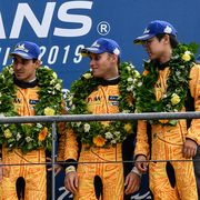Wei Lu celebrates with teammates Jeff Segal and Rodrigo Bapbista on the podium of the&nbsp;2019&nbsp;24 Hours of&nbsp;Le Mans
