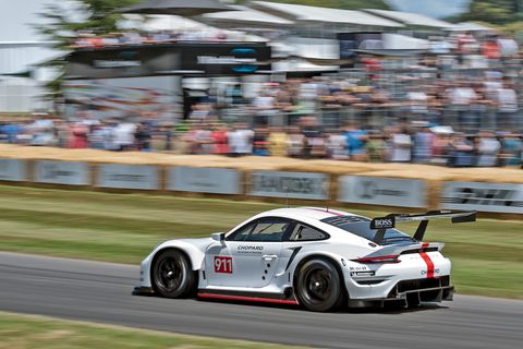 911 RSR goes up the hill at Goodwood
