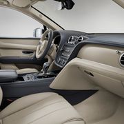 The 2019 Bentley Bentayga Hybrid interior is as top notch as the company's other grand touring cars.
