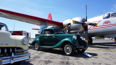 Here's what you missed at the second annual Wings and Wheels at Willow Run, which brought roughly 100 classic cars and almost 40 vintage aircraft to the historic airport in Ypsilanti, Michigan. Proceeds from the event went to support the Yankee Air Museum.
