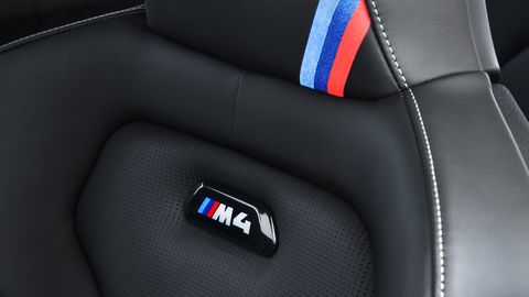 The 2019 BMW M4 CS gets a few special touches inside, like the punch-out CS logo in the dash.
