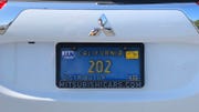 Vehicle registration plate, Automotive exterior, Vehicle, Car, Motor vehicle, Auto part, Bumper, Mitsubishi, Emblem, Subcompact car, 