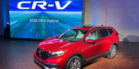 The upcoming 2020 Honda CR-V Hybrid pairs a 2.0-liter Atkinson-cycle inline-four with two electric motors. Total system horsepower is 212. All non-hybrid CR-Vs (shown here in blue) will now get Honda's 1.5-liter turbocharged inline-four, previously only offered on higher-trim vehicles; it's good for 190 hp.

