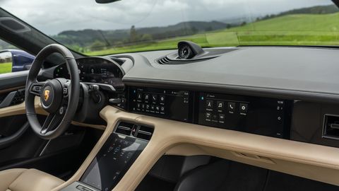 The 2020 Porsche Taycan features a concave digital display to lessen glare.
