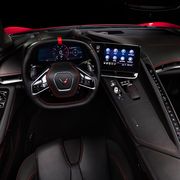 The interior of the 2020 Chevrolet C8 Corvette features buttons for climate, but almost everything else is controlled through the infotainment screen.
