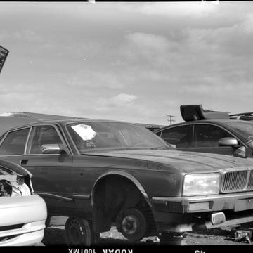 The Jag is about 65 years younger than the camera that photographed it.
