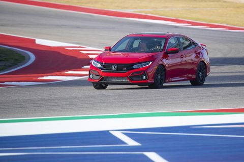 Other than a brake pad change, you're looking at a bone stock 2020 Honda Civic Si lapping Circuit of the Americas. This is the Si sedan.
