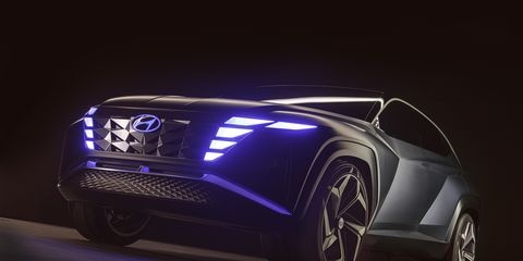 The Hyundai Vision T concept's headlights are hidden away behind mirror-finish surfaces, invisible until they are illuminated.
