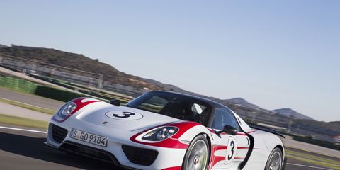 The Porsche 918 Spyder looks appropriate on a race track,&nbsp;with a racing number and livery.
